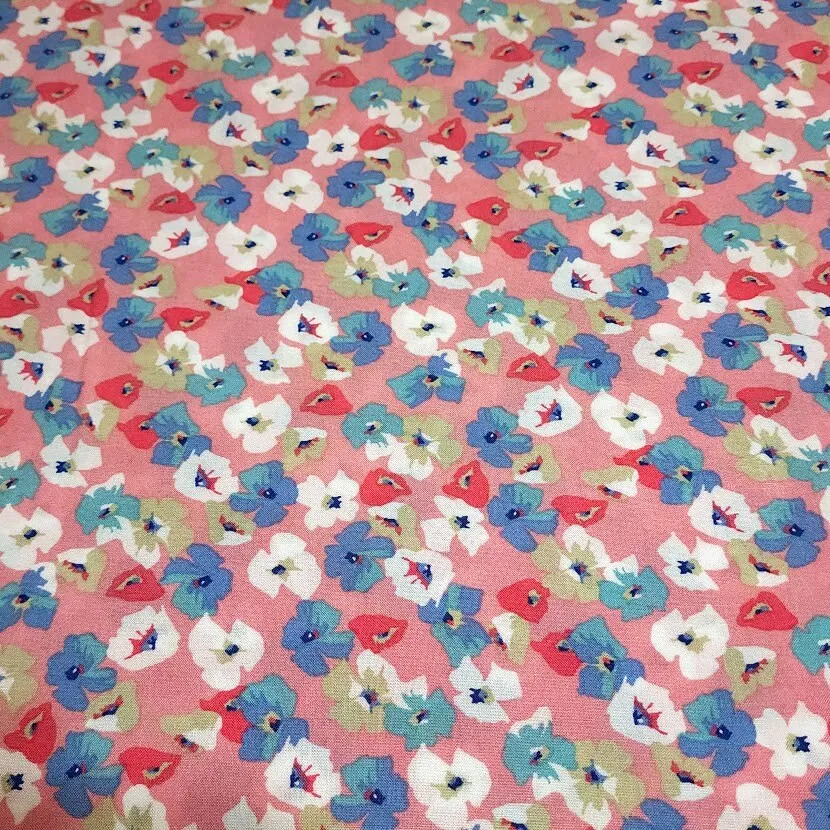 Rayon Challis Fabric, Fun Pretty Pink, Blue, White Floral. Print. Light and Flowing Fabric. Nice Rayon Woven Fabric. Sold by the 1/2 yard